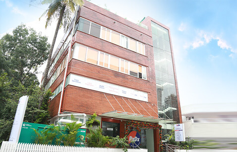 Exterior of the RxDx Samanvay medical building.
